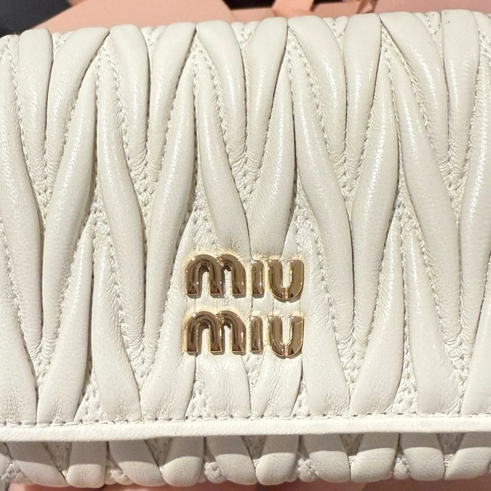 Miu Miu Ivory Matelassé Leather Compact Wallet with Gold Logo